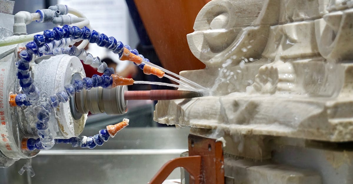 close up of a robotic machine sculpting stone with high precision in an industrial setting