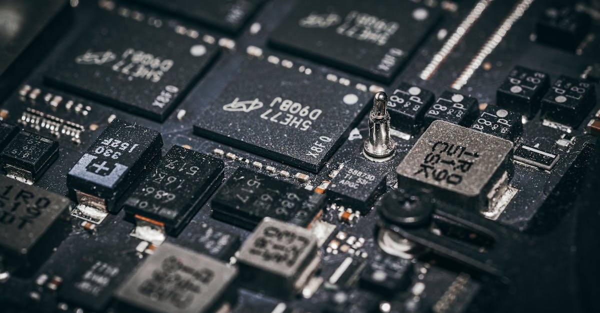 detailed close up of electronic microchips on a circuit board showcasing technology and engineering